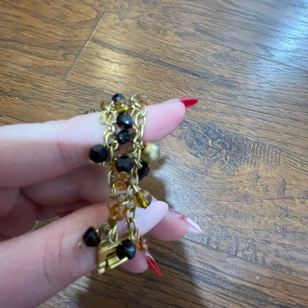 Elegant Gold and Black Beaded Bracelet watch